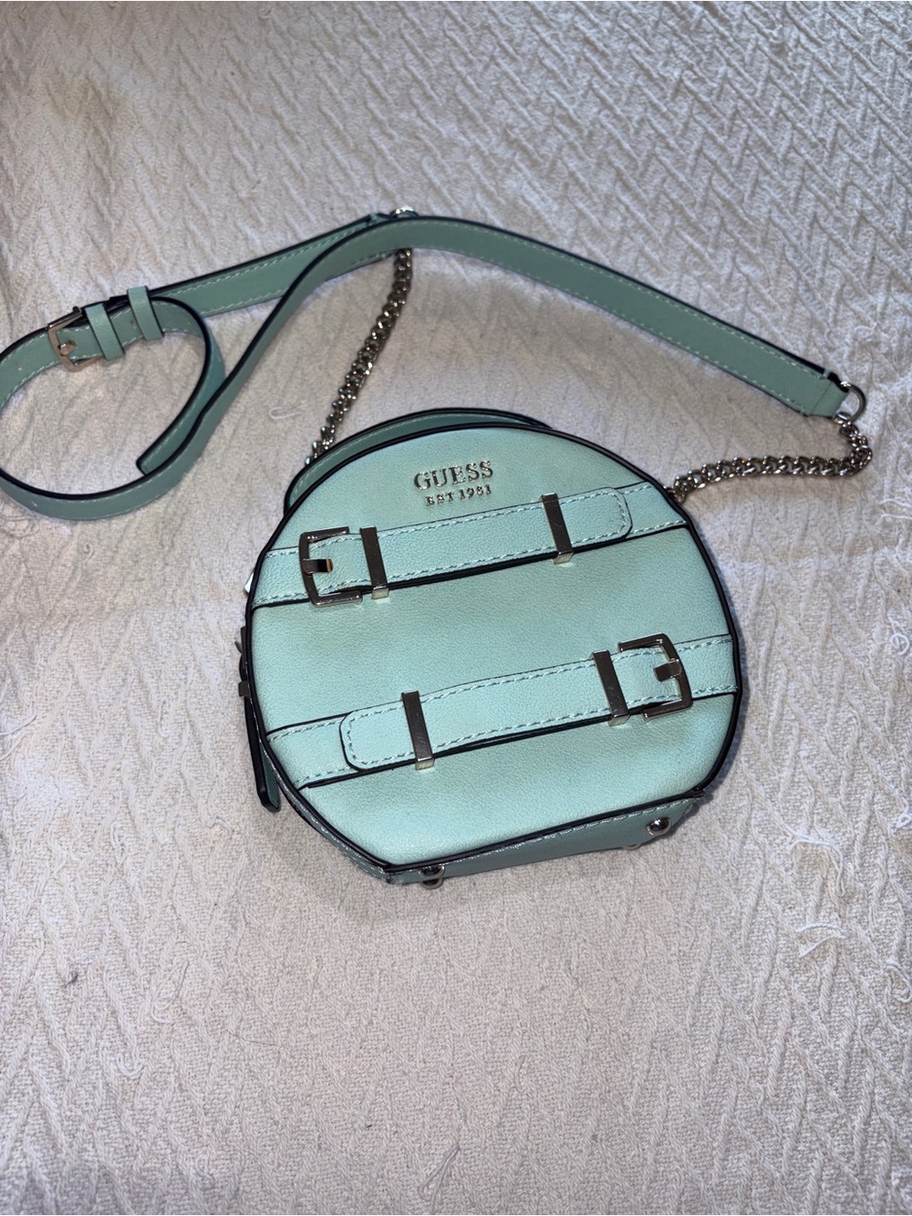 GUESS Mint Round Crossbody with Buckle Straps